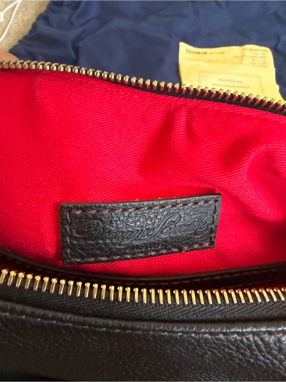 Dooney & Bourke Black Leather Toiletry Pouch with Red Interior